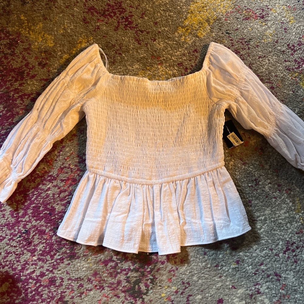 white ruffled long sleeve 🤍